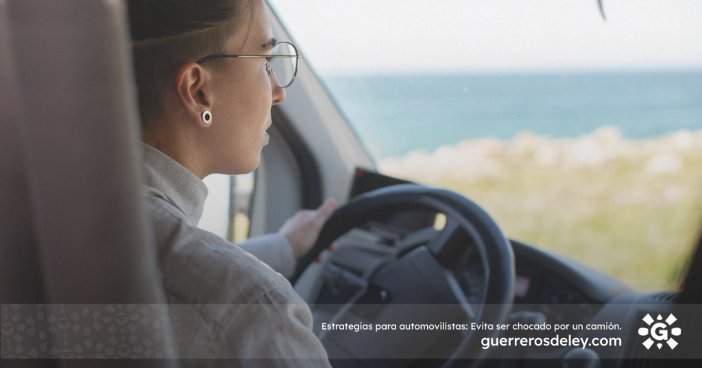 Mujer manejando vehículo grande